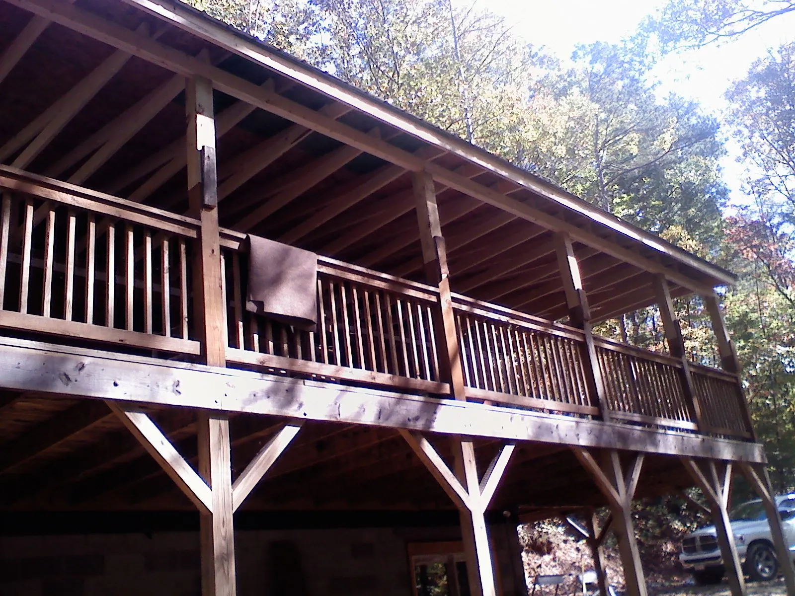 Timber framing under a new elevated porch and deck — Roof Leak Repair in Hill Afb by Roofing Brothers